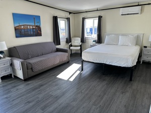 One Bedroom Double Queen Suite with Deck Photo 1